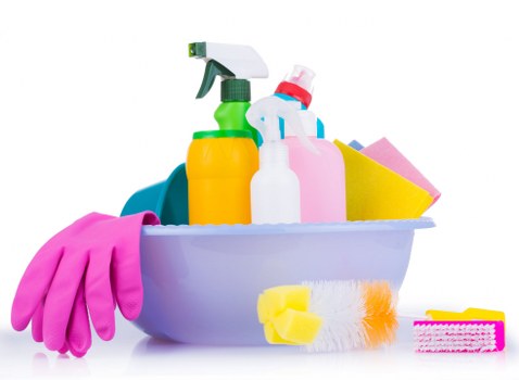 Cleaning service professional preparing a booking under UK terms