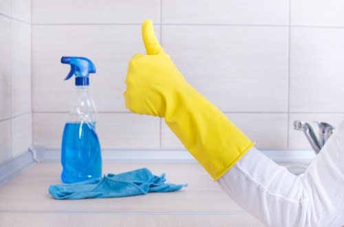 Professional deep cleaning kitchen during tenancy move-out in W4